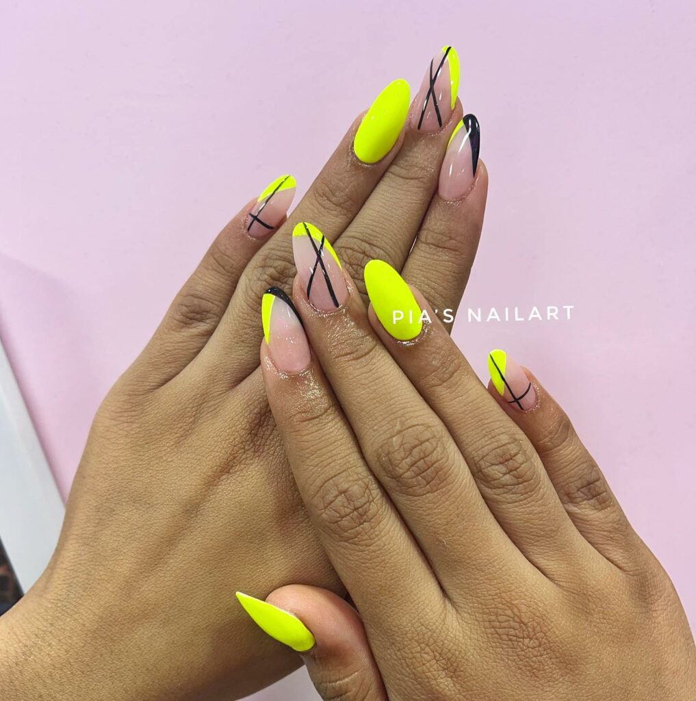 20 Latest Neon Yellow Nail Ideas To Try In 2024! 34 Neon Yellow Almond Nails With Black Line Design
