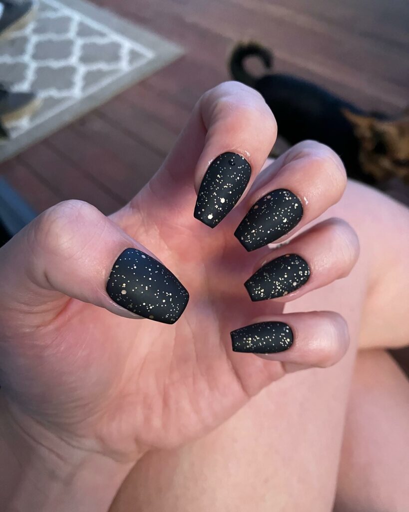 19 Latest Black Glitter Nail Designs To Try In 2024! 11 Matte Black Nails With Gold Glitter