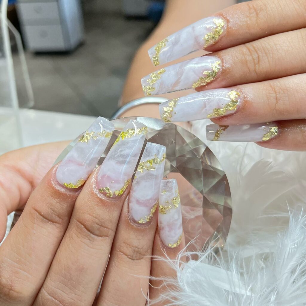Embrace Elegance with 15 White Marble Nail Designs in 2024 16 White Marble Acrylic Nails With Gold Flakes