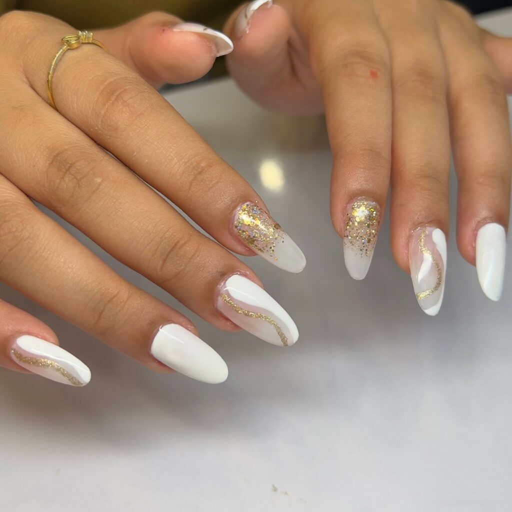 Admire 25 White Almond Nail Designs of 2024 15 White And Gold Almond Nails