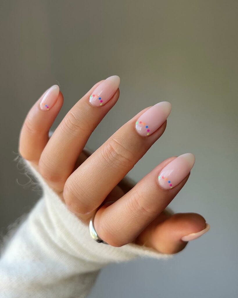 Glow with 20 Pearl White Nail Designs in 2024 23 White Pearl Nails With Rainbow Dots