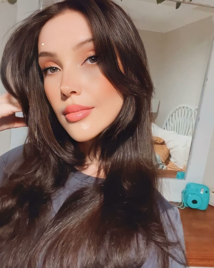 45 Wispy Long Curtain Bang Hairstyles to Try in 2024 16 Chocolate Brown Hair with Curtain Bangs