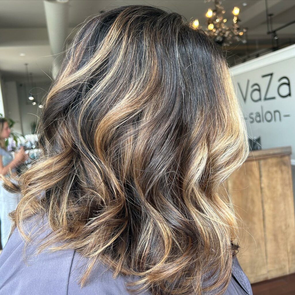 44 Trendy Blonde Highlights On Brown Hair Ideas to Try in 2024 36 Wavy Dark Lob with Blonde Streaks