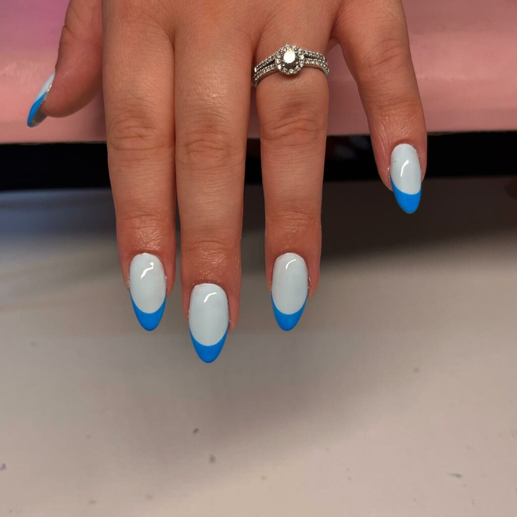 30 Latest Almond French Tip Nail Designs To Try In 2024! 24 Blue French Tip Almonds