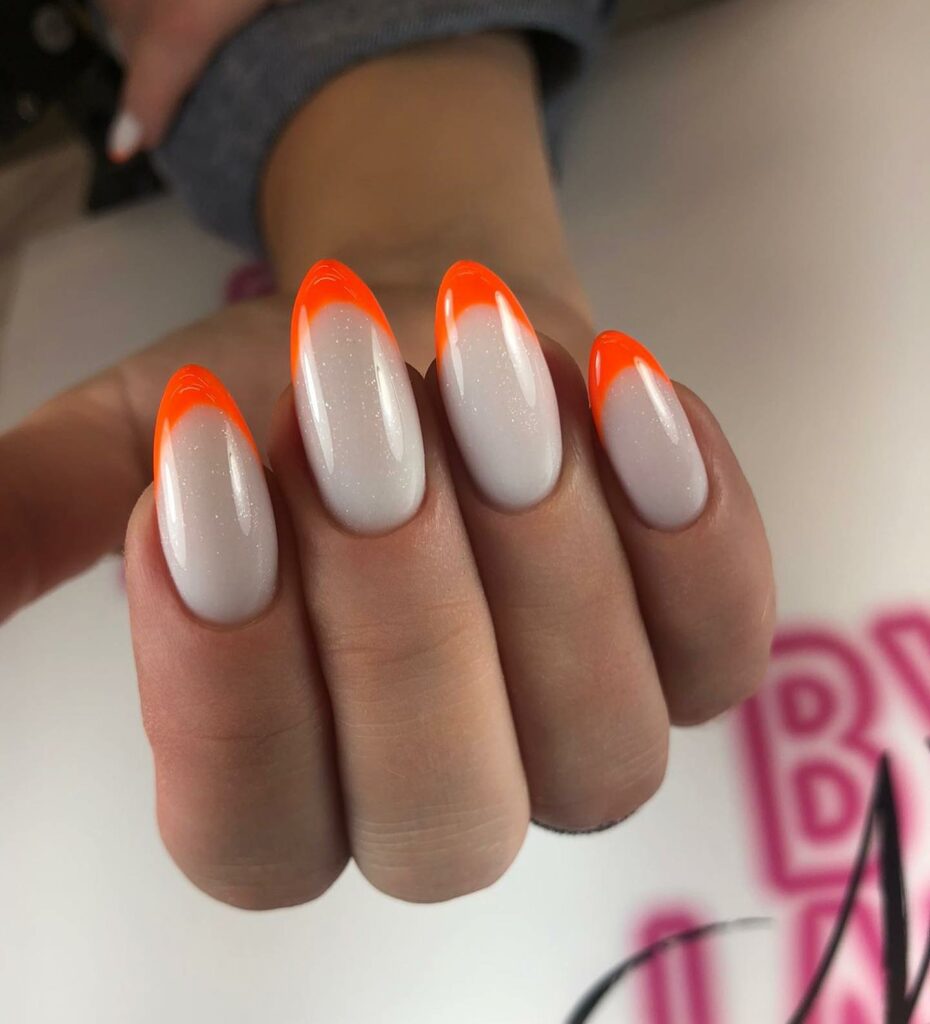 Get Inspired by 30 Neon Orange Nail Designs of 2024 19 Crystal French Neon-Orange Nails