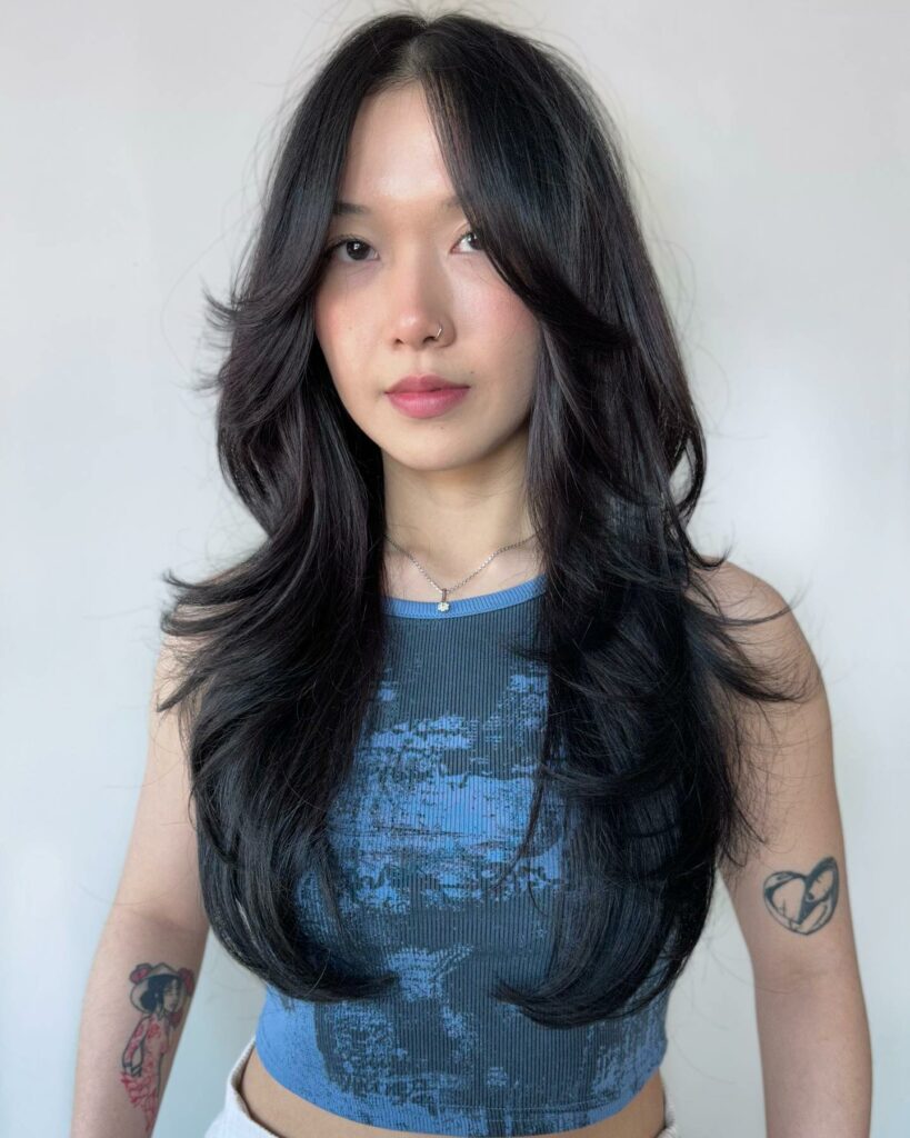 35 Long Wolf Cut Hairstyle Ideas to Try in 2024 17 Long Wolf Cut with Wispy Layers