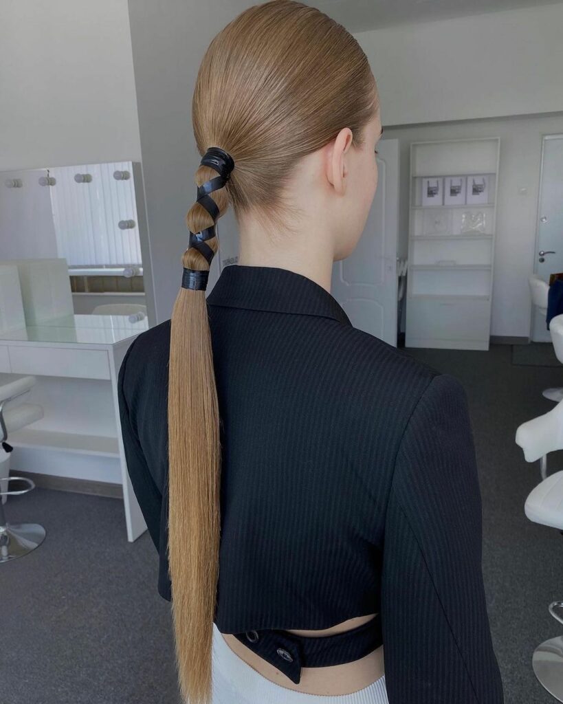 35 Ponytail Hairstyles Ideas for Effortless Elegance in 2024 30 The Unique Half-Wrapped Ponytail