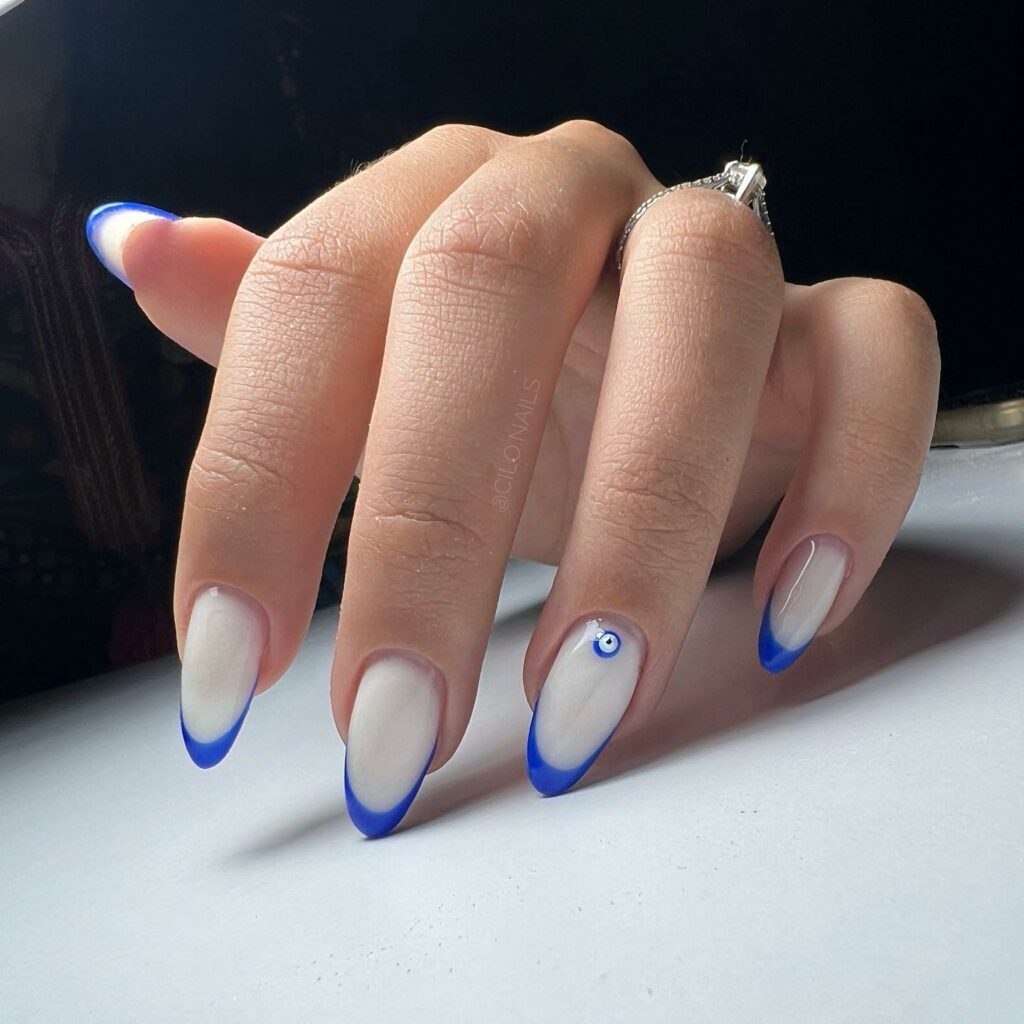 30 Latest Blue And White Nail Ideas To Try In 2024! 31 Blue And White French Nails With Evil Eye Design