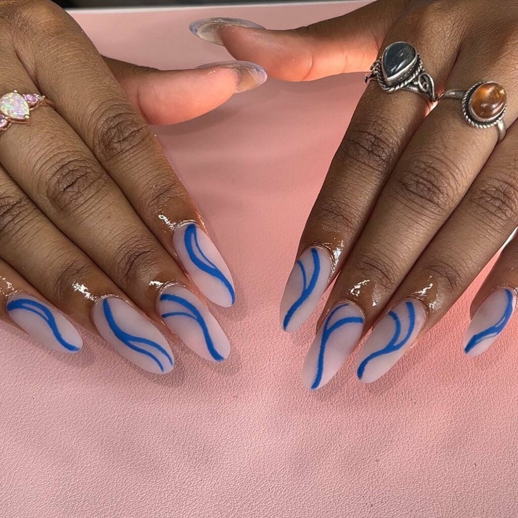 Get Swirly with 35 Swirl Nails Ideas for 2024 12 Matte Blue Swirl Nails
