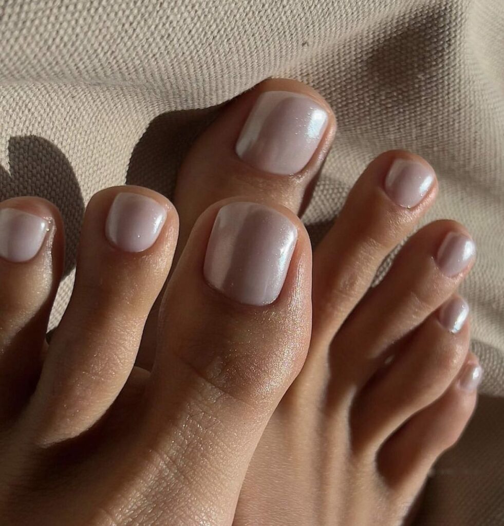 21 Latest Nude Pedicure Designs To Try In 2024! 14 Pearl Inspired Nude Pedicure