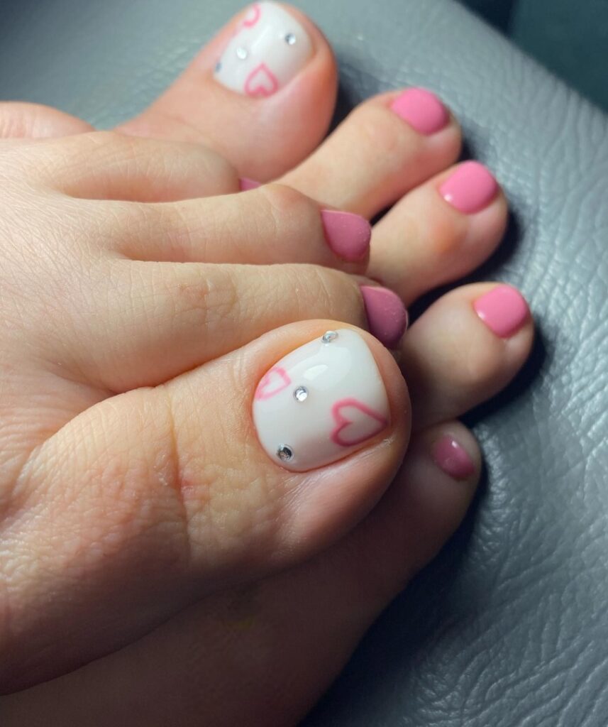 Get Playful with 30 Heart Toenail Pedicure Ideas for 2024 26 Pink Heart Nail Art With Stones