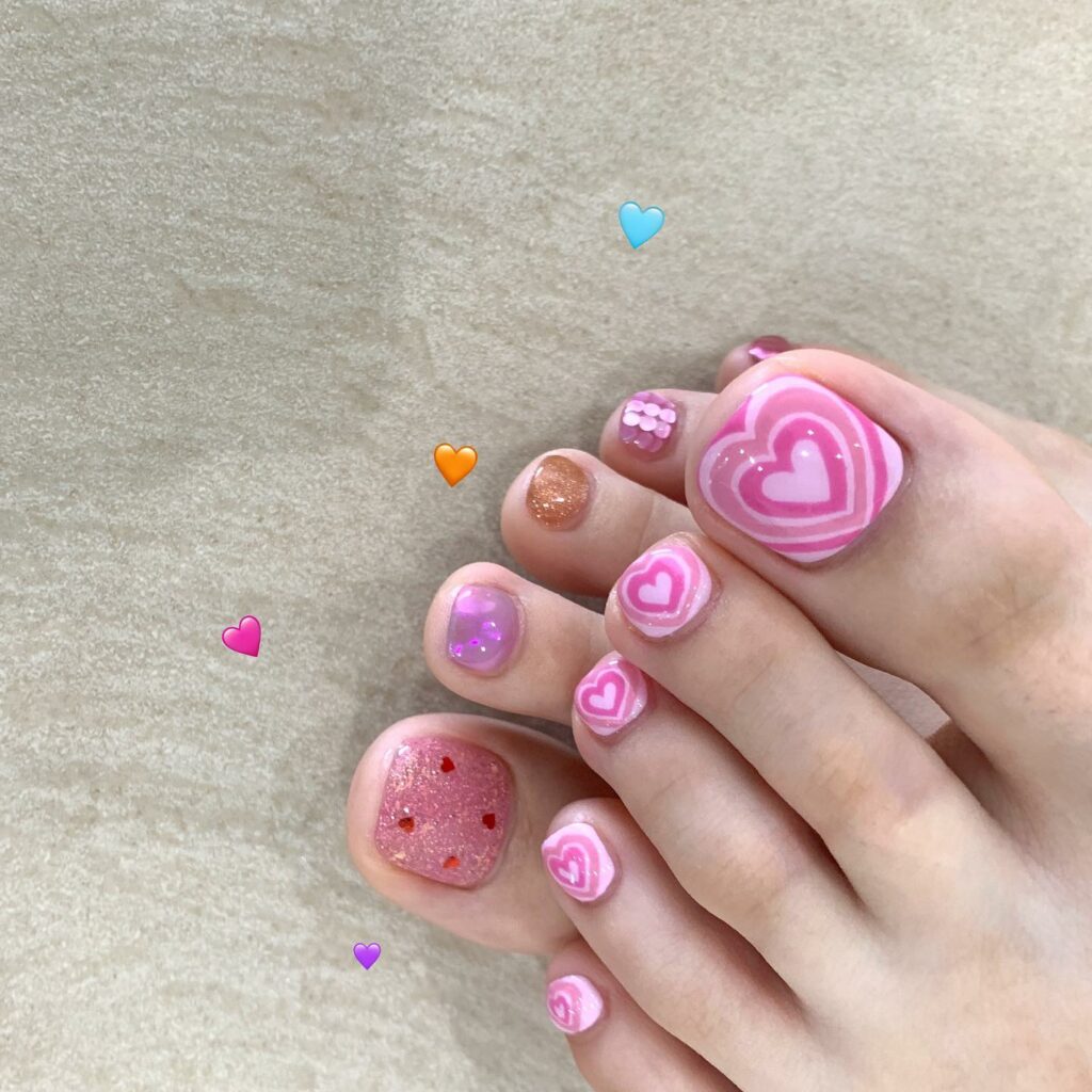 Get Playful with 30 Heart Toenail Pedicure Ideas for 2024 11 Pink Heart Nail Pedicure