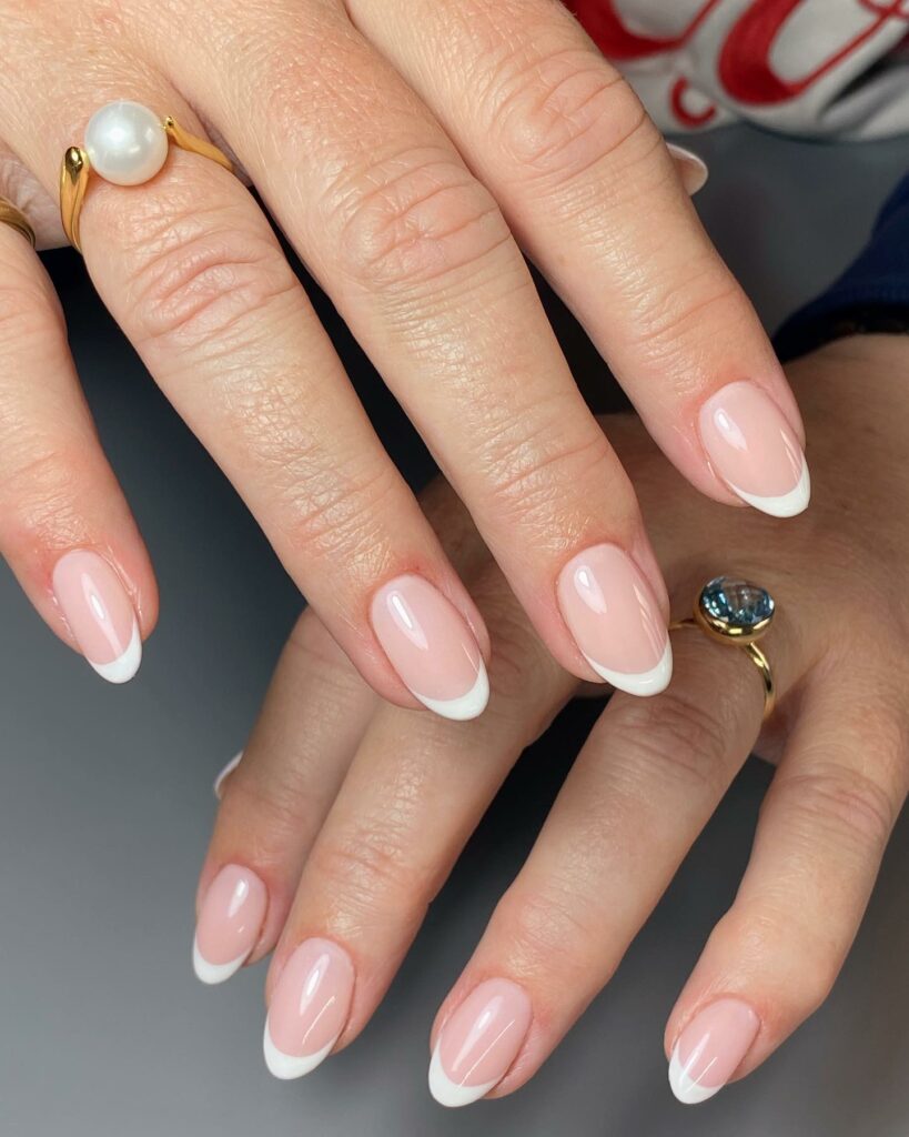 Admire 25 White Almond Nail Designs of 2024 10 White French Tip Almond Nails