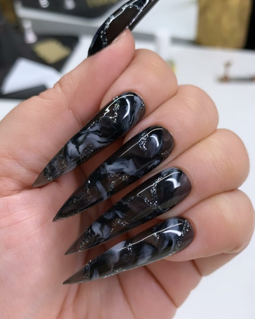 40 Latest Black Stiletto Nail Ideas To Try In 2024! 13 Marble Black Nails