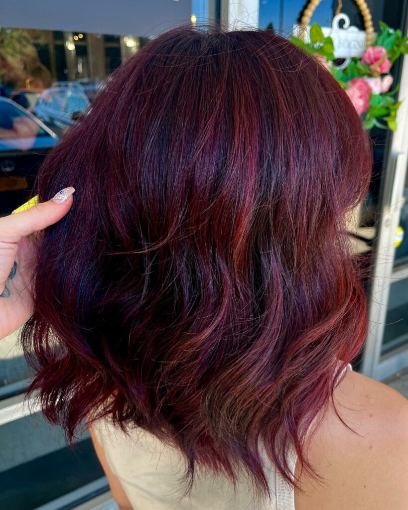 55 Bold Burgundy Dark Red Hair Ideas to Try in 2024 64 Dark Purple Loose Locks