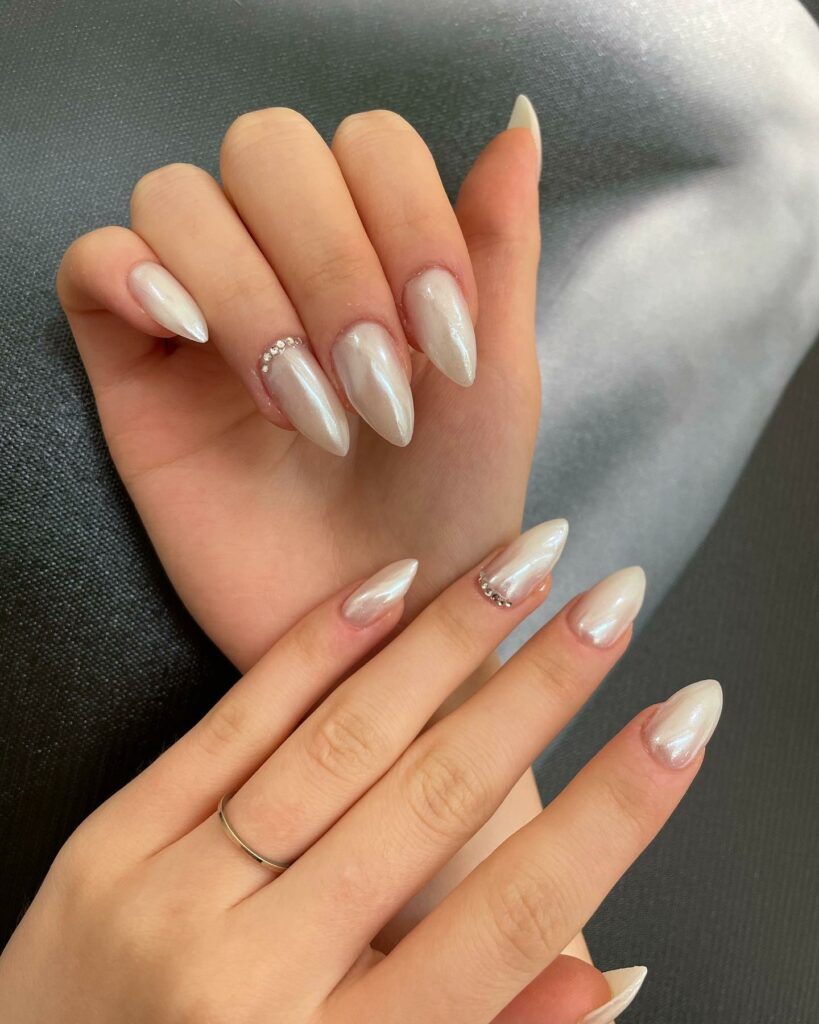 Glow with 20 Pearl White Nail Designs in 2024 15 Creamy White Pearl Nail With Rhinestones