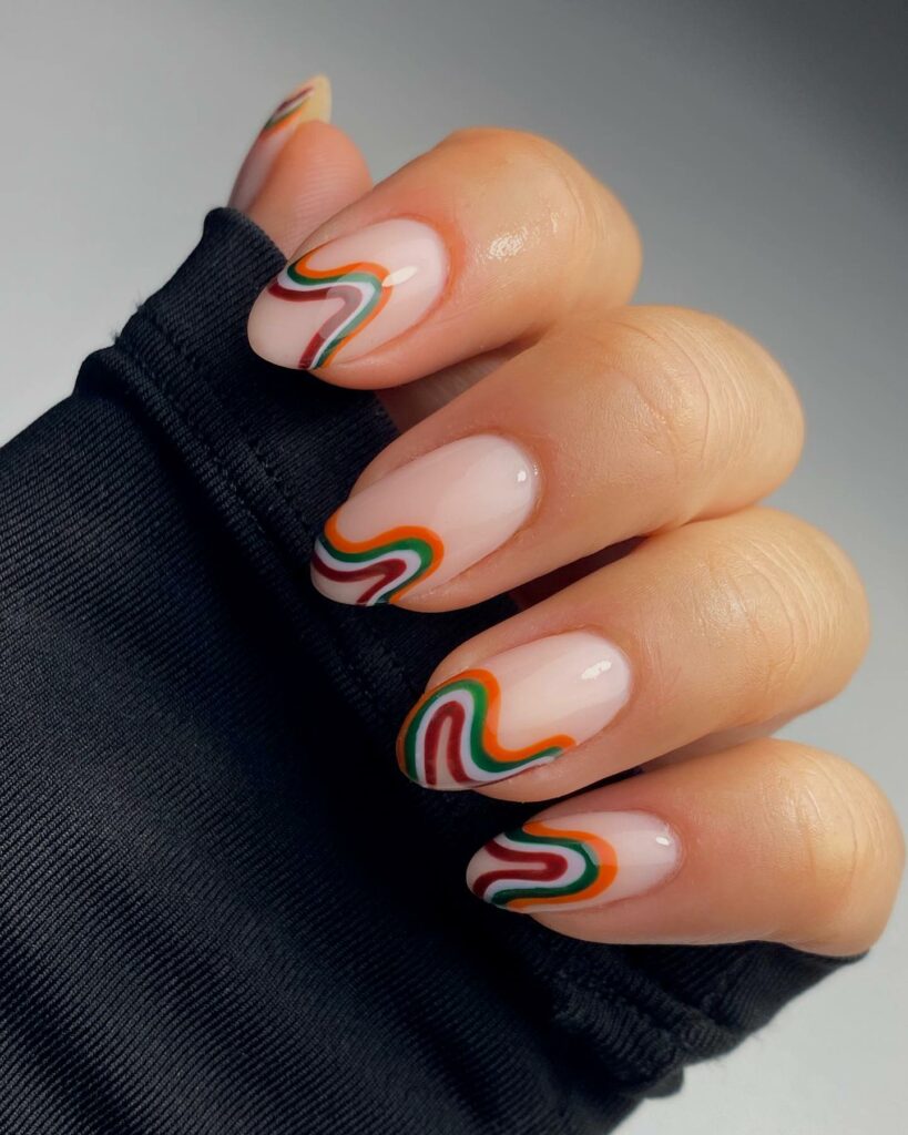 20 BEST 70S NAIL DESIGNS TO TRY IN 2024! 11 70s Retro Swirl Nails