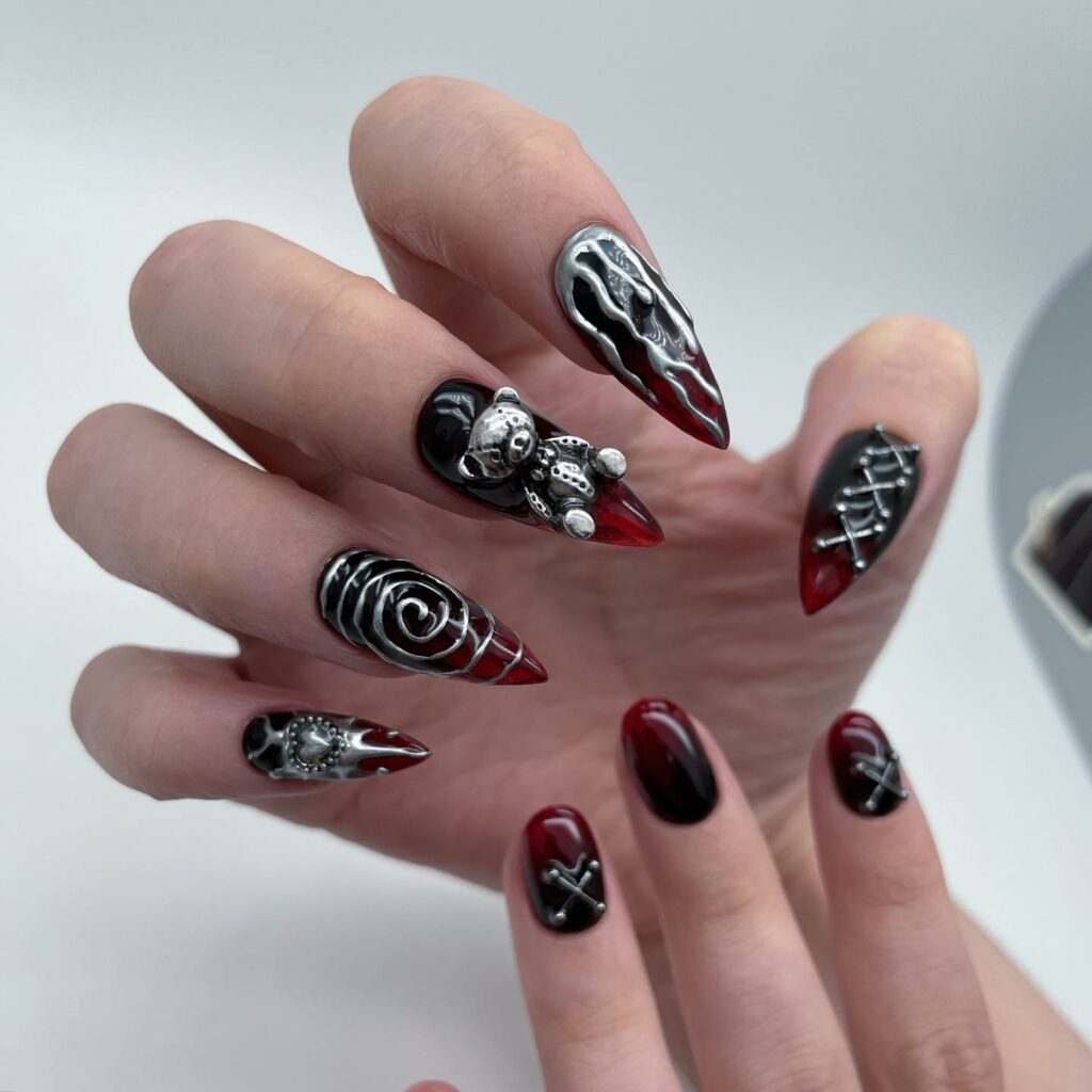 25 Latest Gothic Nail Ideas To Try In 2024! 17 Gothic Nails With Silver Swirl And Stuff Toy Design