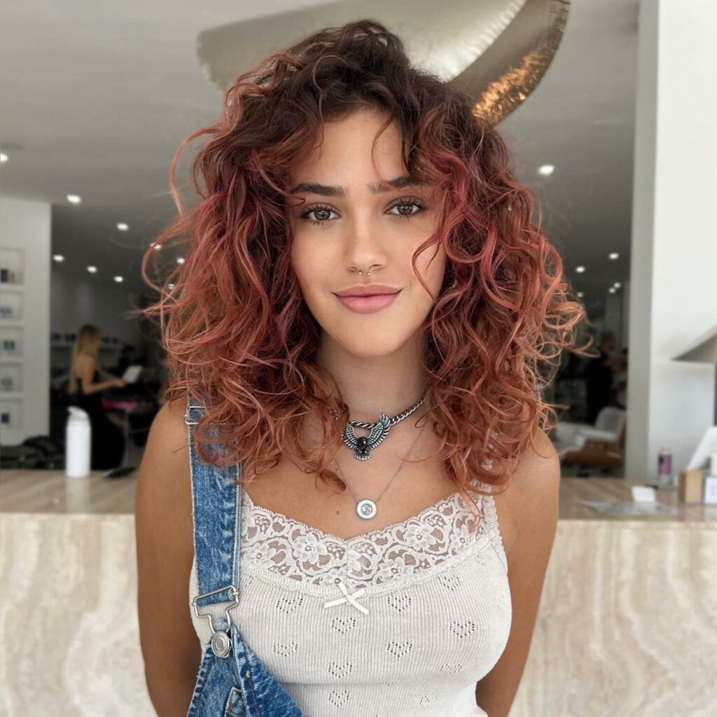 35 Strawberry Blonde Hair Ideas to Try in 2024 11 Bright Strawberry Curly Hair