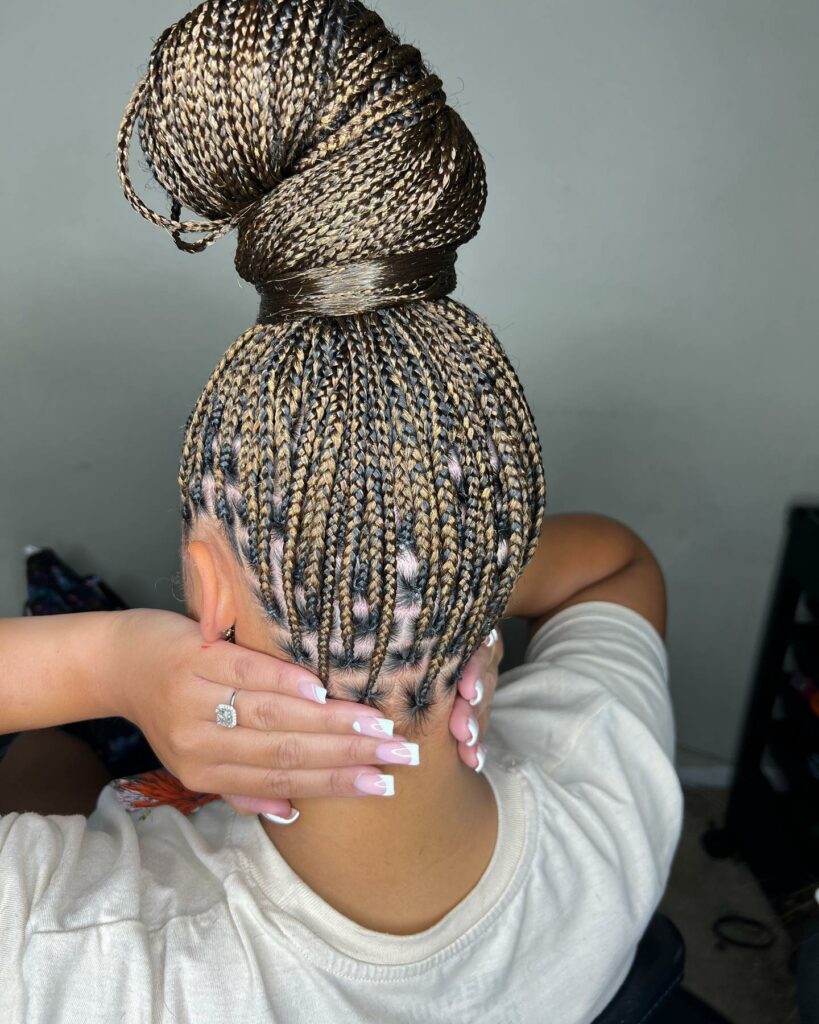 35 Micro Braids Ideas to Elevate Your Hairstyle in 2024 37 Micro Braids in a Loose High Bun