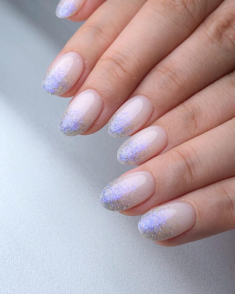 40 Latest Short Summer Nail Designs To Try In 2024! 39 White And Glitter Ombre Short Round Nails