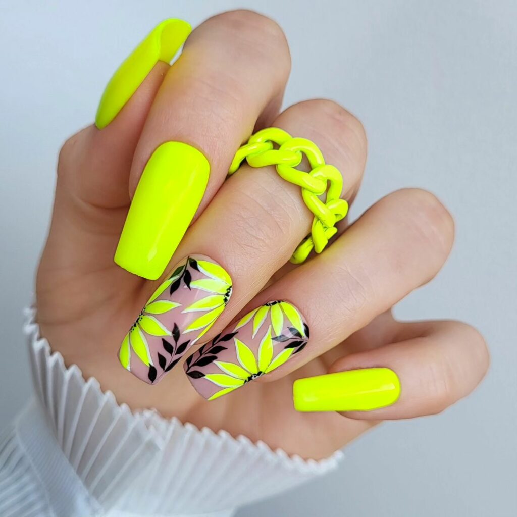20 Latest Neon Yellow Nail Ideas To Try In 2024! 11 Abstract Neon Yellow Nails With Flower