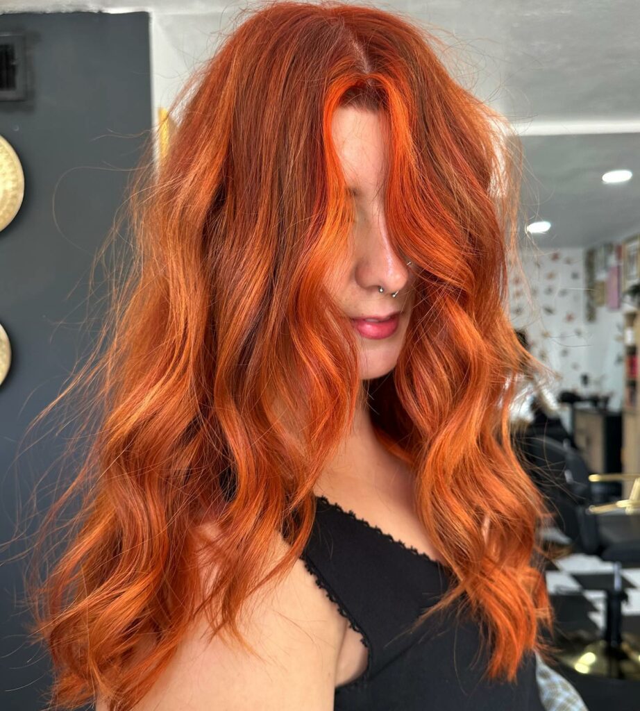 35 Copper Hair Color Ideas to Spice Up Your Look in 2024 33 Bright Copper with an Orange-Red Tinge