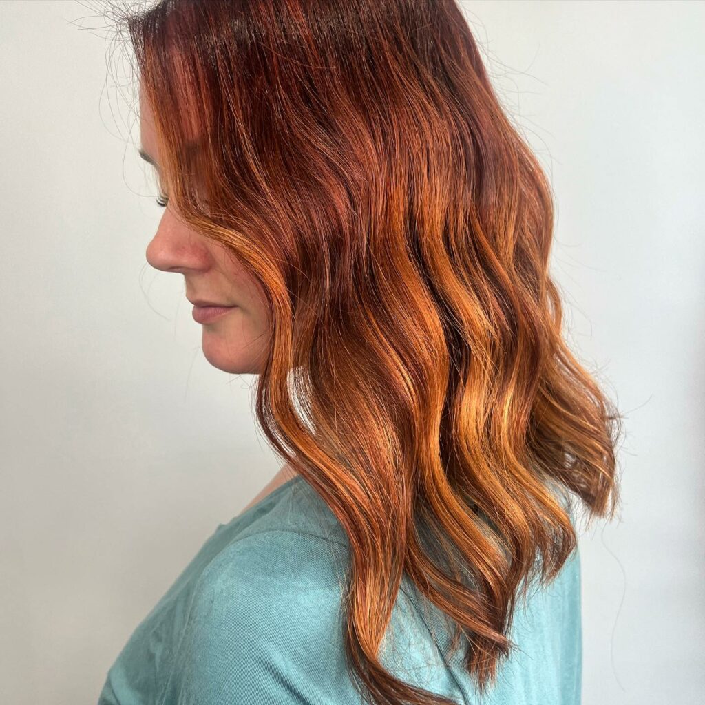 35 Copper Hair Color Ideas to Spice Up Your Look in 2024 28 Red Brick Waves with Light Copper Ribbons
