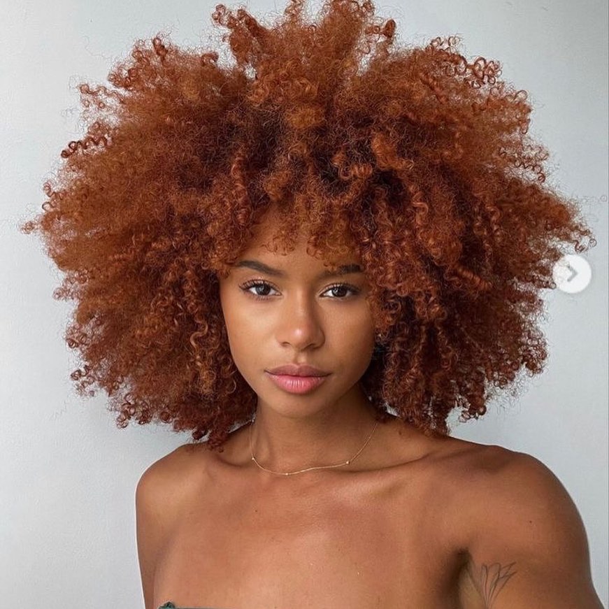 35 Dark Red Hair Ideas to Add Drama to Your Look in 2024 28 Natural Dark Red Hair Color on Corkscrew Curls