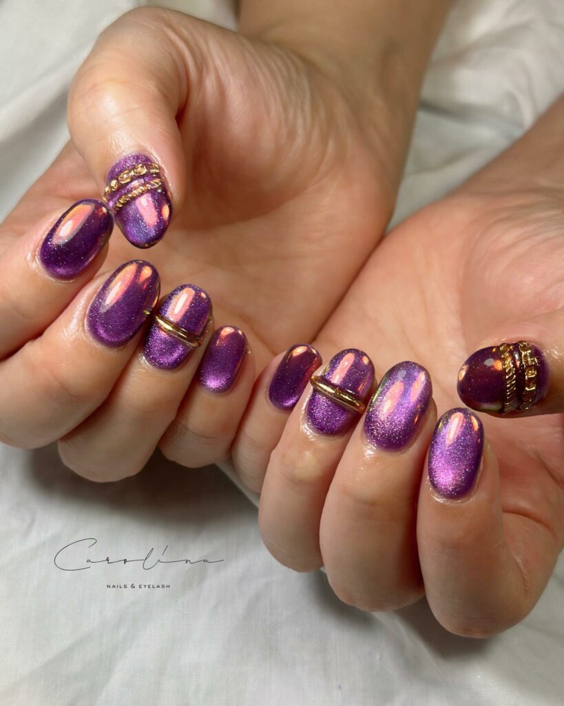 20 Latest Purple And Gold Nail Ideas To Try In 2024! 21 Cat Eye Purple Round Nails With Gold Chain Design