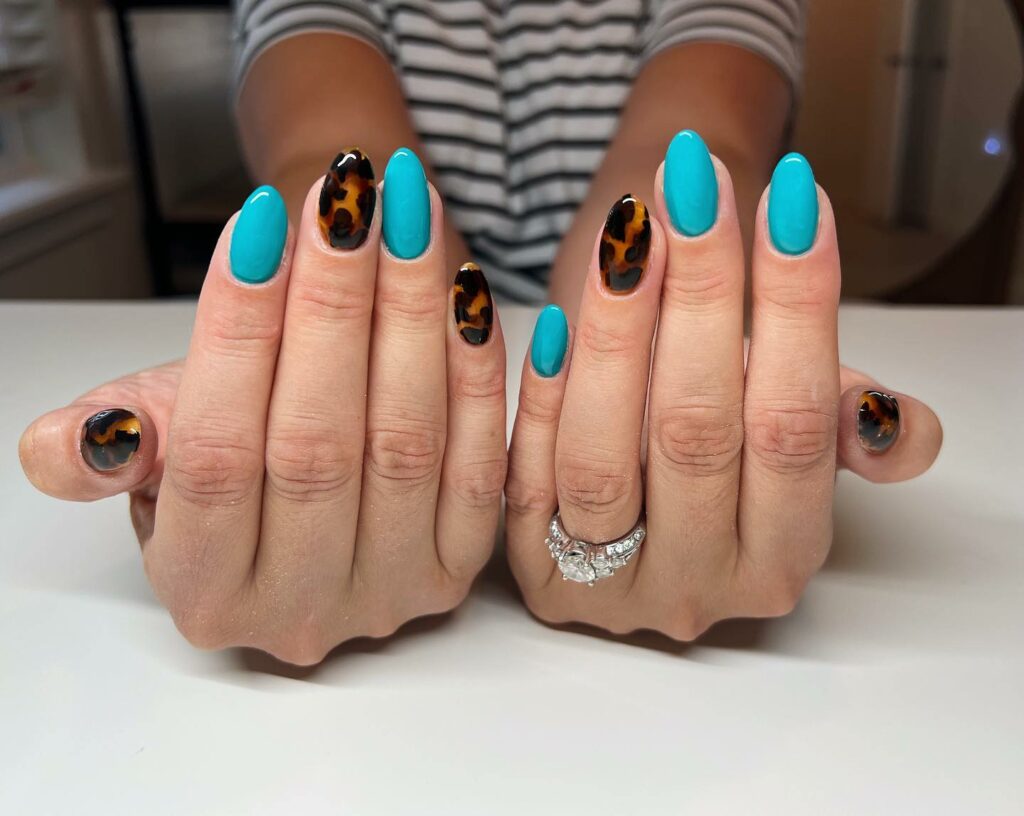 Dive into 60 Turquoise Nail Designs of 2024 52 A Walk On The Wild Side