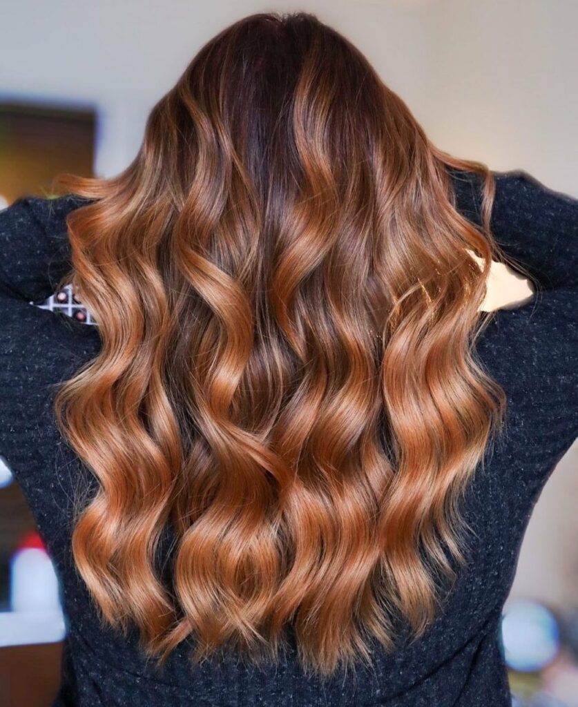 35 Copper Hair Color Ideas to Spice Up Your Look in 2024 19 Apricot Highlights on Warm Brown Waves