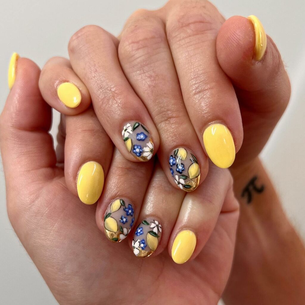 Short Round Lemon Nails With Blue Daisies Design