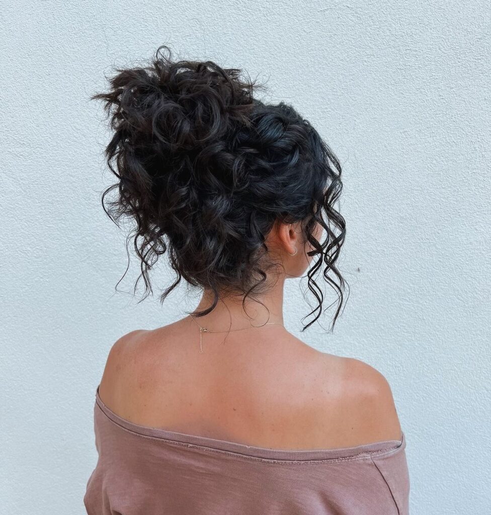 30 Curly Hairstyles Ideas to Flaunt Your Curls in 2024 21 Folded Voluminous Updo
