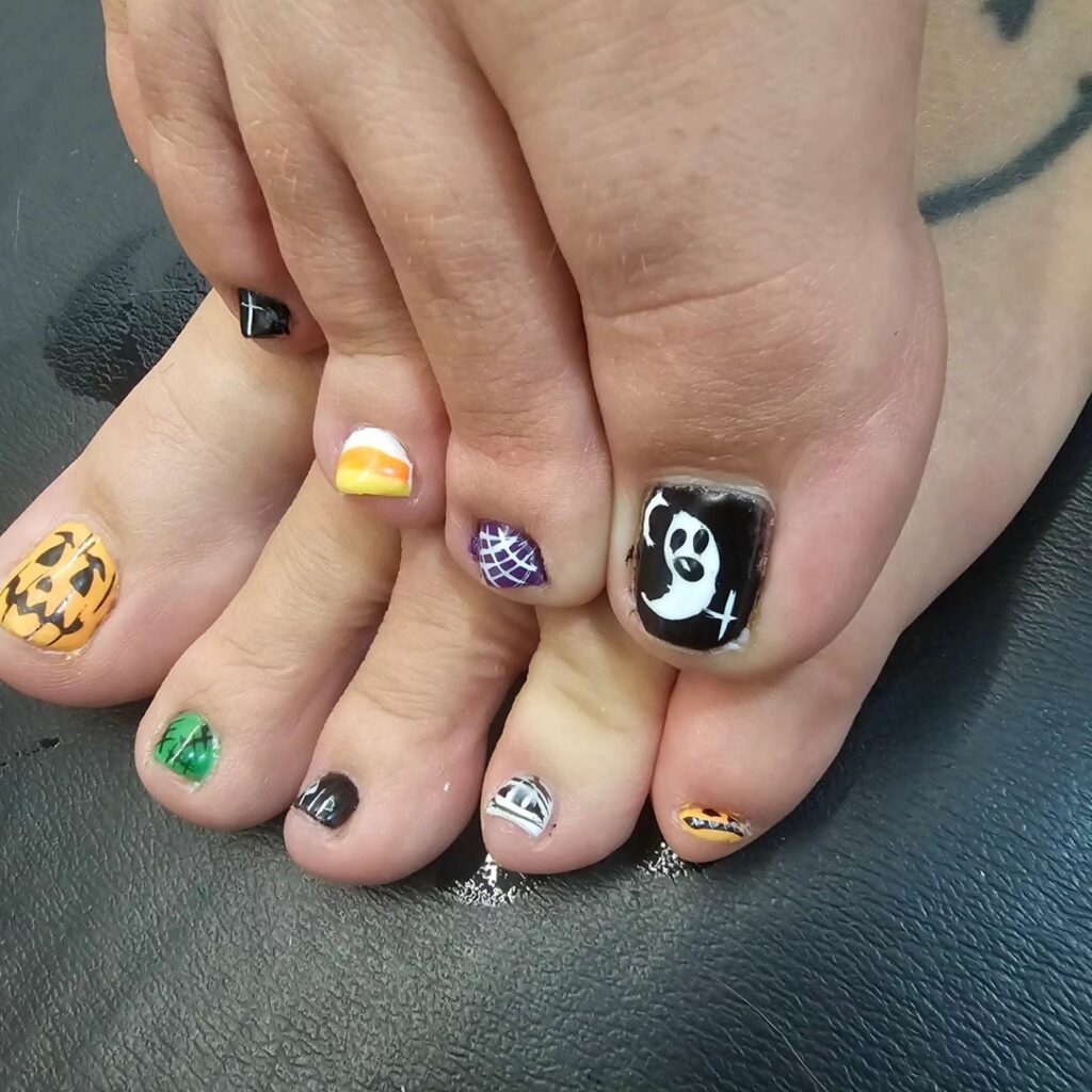 30 Spooky Halloween Pedicure Ideas to Try in 2024 27 The Artistry of Halloween