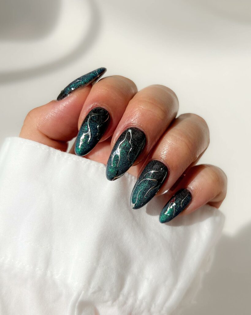 Get Edgy with 30 Green And Black Nail Designs in 2024 27 Green And Black Ombre Nails With Glitter And Silver Swirls