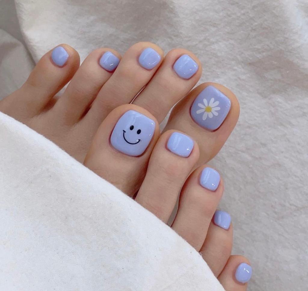 30 Light Blue Pedicure Ideas to Try in 2024 38 Light Blue Pedicure With Emoji and Flower Design