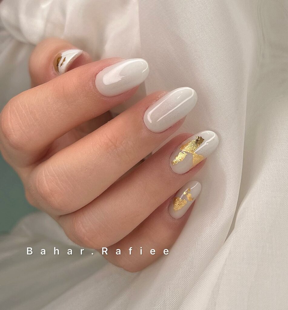 30 Latest White And Gold Nail Ideas To Try In 2024! 41 Glossy White Nails With Gold Foils