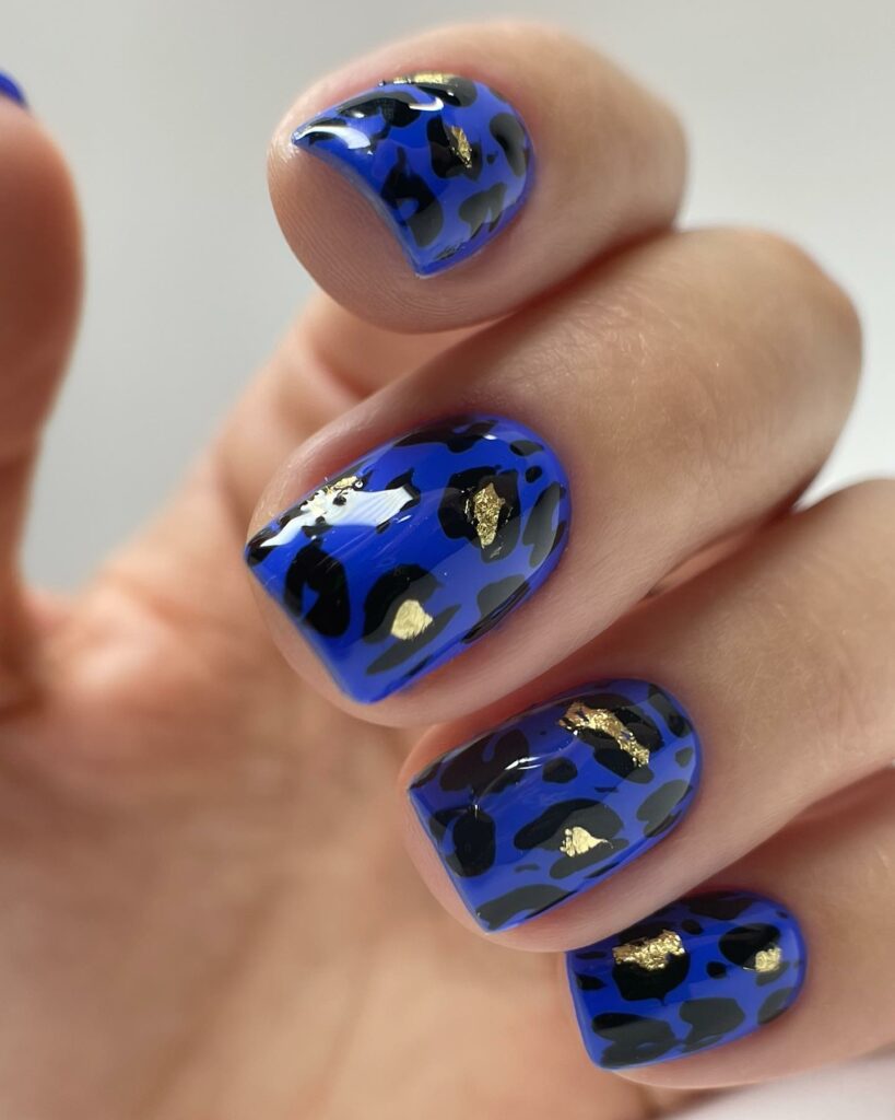 35 Latest Dark Blue Nail Designs To Try In 2024! 29 Animal Pattern Dark Blue Nails