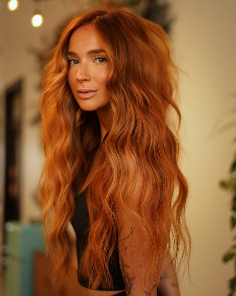 35 Strawberry Blonde Hair Ideas to Try in 2024 15 Strawberry Blonde Wavy Hair