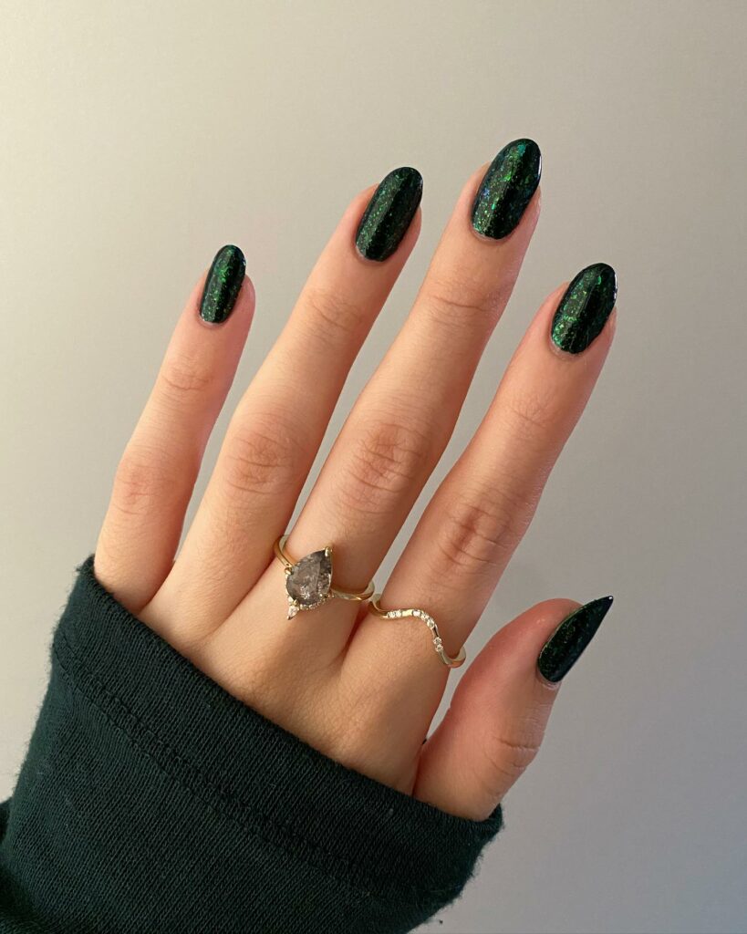 Get Edgy with 30 Green And Black Nail Designs in 2024 14 Almond Green And Black Nails With Glitter