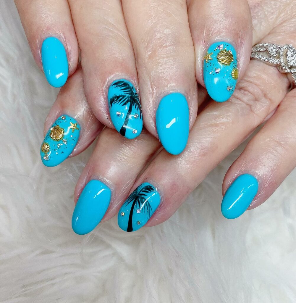 Feel Tropical with 35 Tropical Nails Designs for 2024 33 Blue Palm Tree Accent
