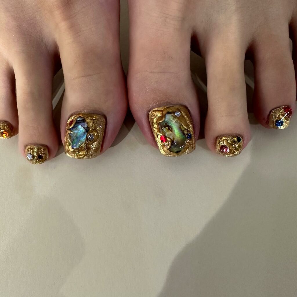 30 Gold Pedicure Ideas to Add Glamour to Your Look in 2024 28 Rhine Stones On Gold Pedicure