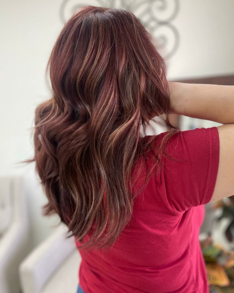 35 Dark Red Hair Ideas to Add Drama to Your Look in 2024 41 Dark Red-Brown Hair with Caramel Highlights