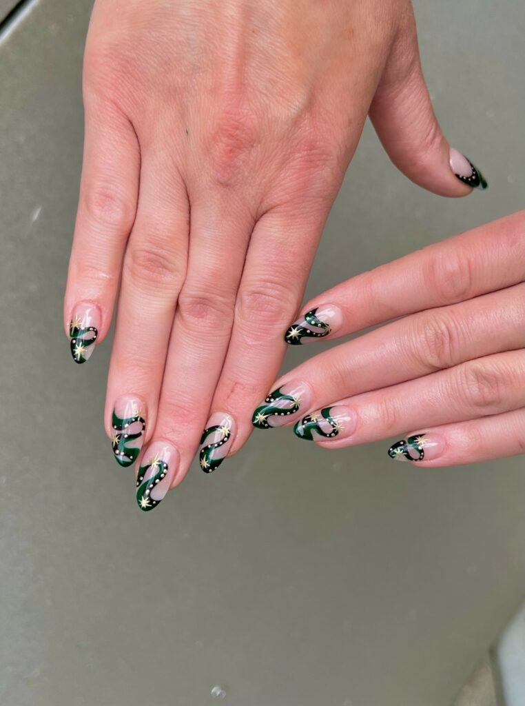 Get Edgy with 30 Green And Black Nail Designs in 2024 36 Green And Black Swirl Nails With Gold Glitters
