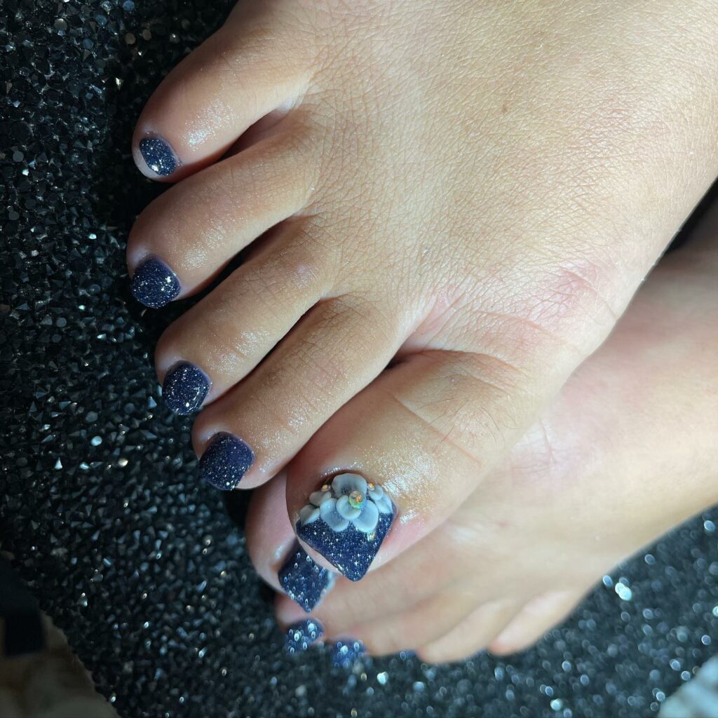 27 Latest Blue Pedicure Designs To Try In 2024! 33 A Sprinkle Of Elegance On Royal Blue