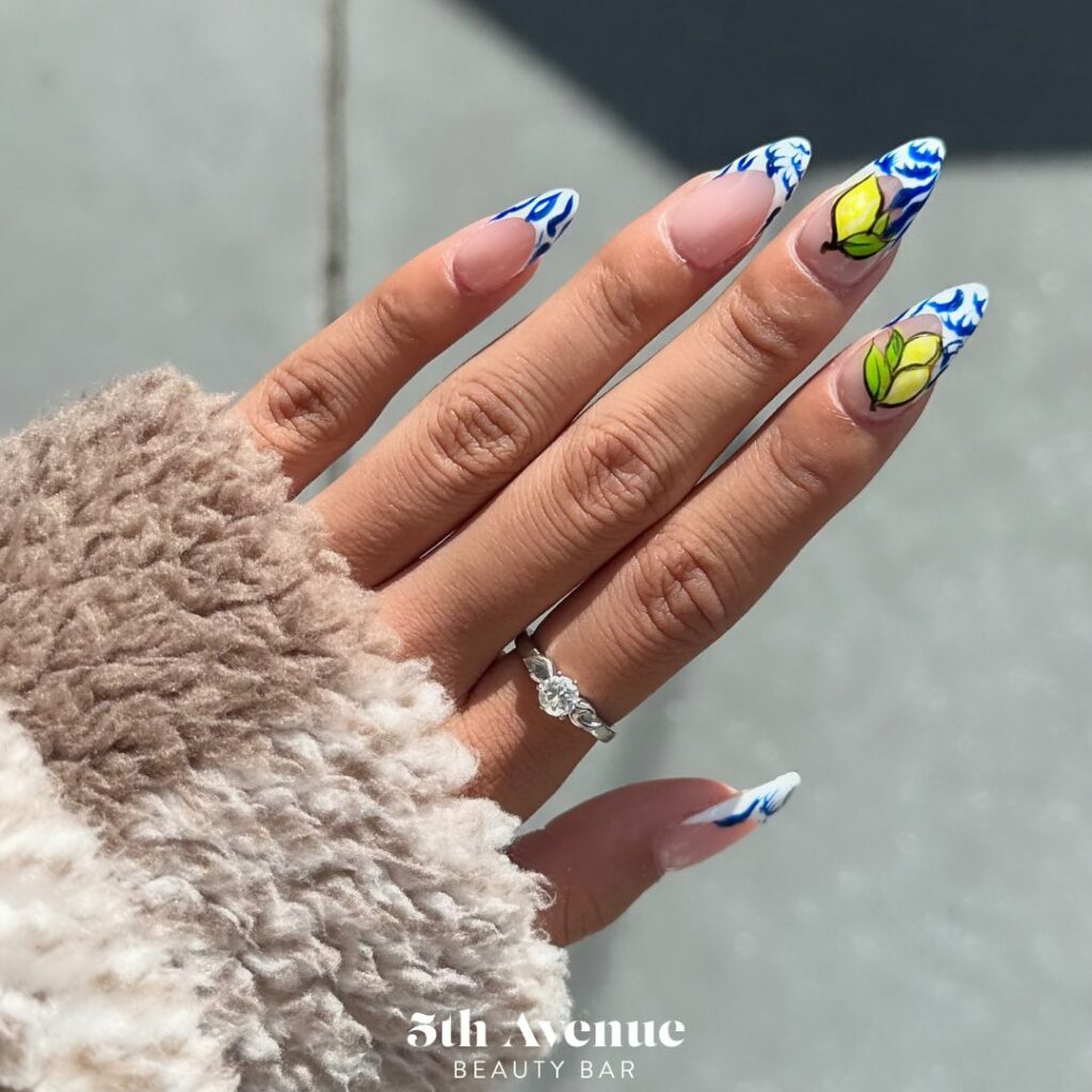 Lemon Design On Blue French Almond Nails