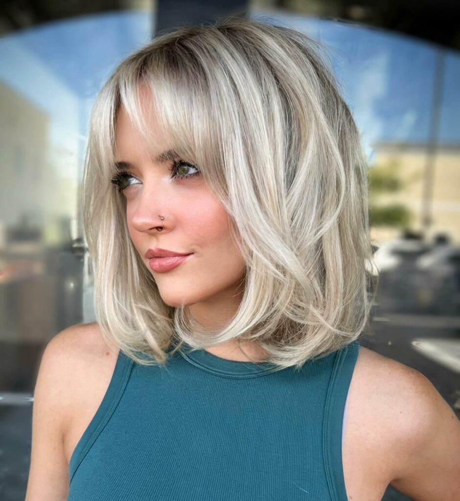 30 Medium Length Hairstyles Blonde Ideas to Try in 2024 15 Soft Shoulder Cut