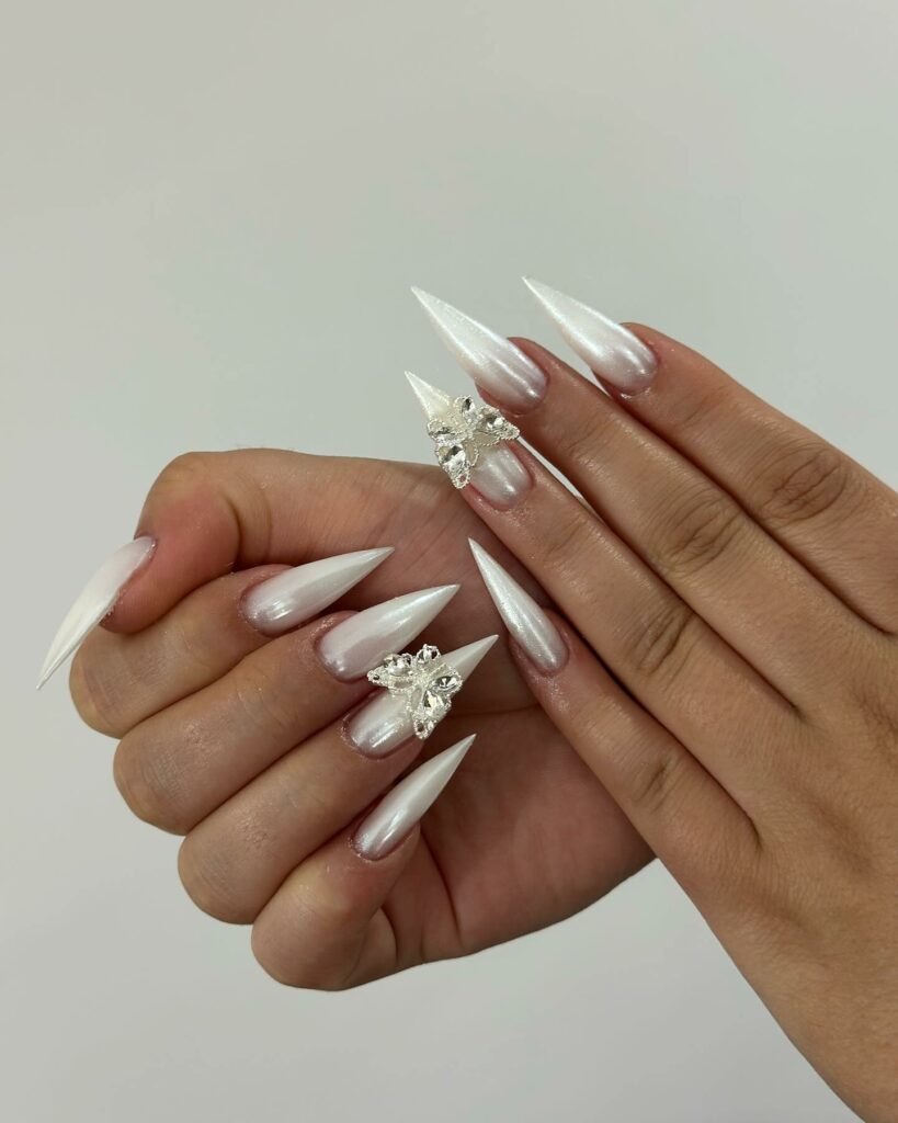 44 Latest White Nail Ideas To Try In 2024! 22 Stiletto-Shaped Chrome Pearl White Nails