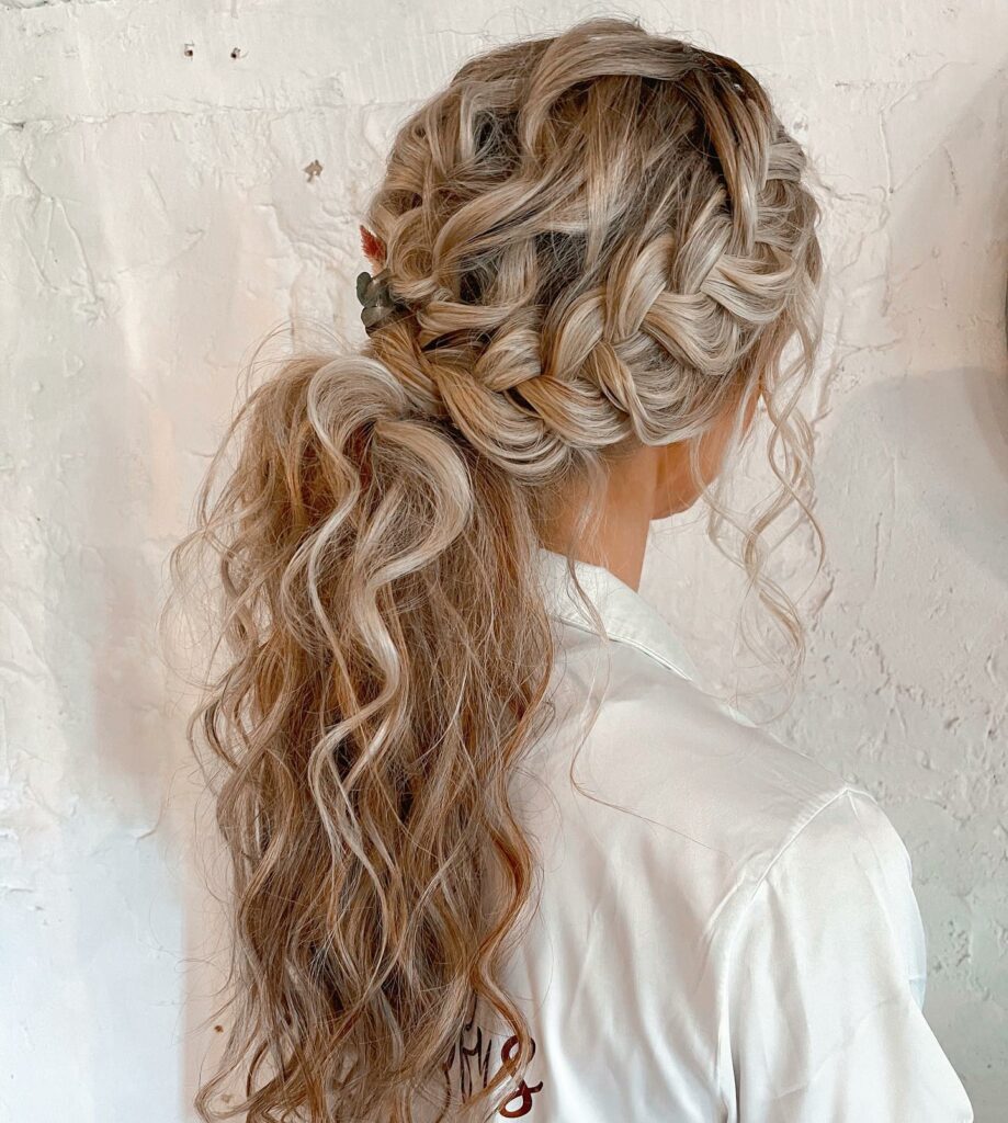 30 Curly Hairstyles Ideas to Flaunt Your Curls in 2024 12 French Braided Low Ponytail